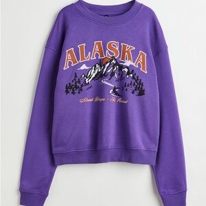 Purple Alaska Graphic Sweatshirt with Orange Lettering